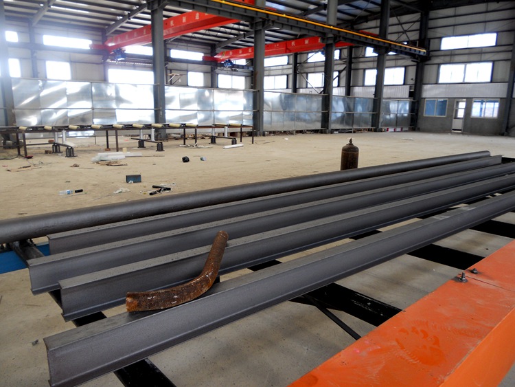 通过式抛丸机清理工型钢